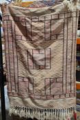 Beige kilim with central square medallion on geometric pattern field, square spandrels, multiple