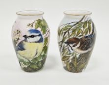 Two limited edition bone china oviform vases painted with birds by Helen Halloran, late 20th