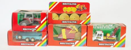 Five boxed Britains diecast models to include 9581 Unimog Breakdown Truck, 9532 Round Baler, 9529