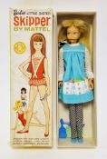 Skipper by Mattel, Barbie's Little Sister, blonde, stock no.0950, with turquoise pinafore, camera,