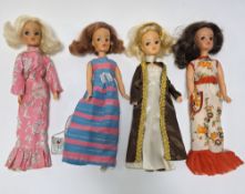 Four Pedigree Sindy dolls, circa 1970's, two with blonde hair, one with auburn hair and one with