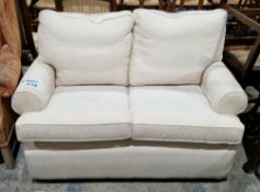 Small Multiyork two seater sofa upholstered in a cream linen type fabric, on short square legs, 89cm