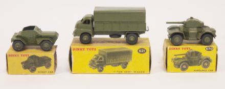 Three boxed Dinky Toys diecast model military vehicles to include 621 3-ton Army Wagon (missing