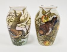 Two limited edition bone china oviform vases painted with birds by Helen Halloran, late 20th