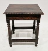 18th century oak low table with rectangular top with carved frieze on turned and block supports,