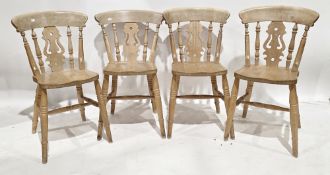 Set of four beech wood Windsor-style fiddle back dining chair, on turned legs united by H-