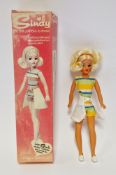 Sindy by Pedigree, no.S676, wearing white, blue, green and orange shorts outfit and wraparound skirt