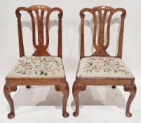 Pair of mid-18th century walnut side chairs having scroll pierced central splat, drop-in seat with