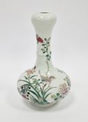 Chinese porcelain famille rose garlic-necked bottle vase of compressed globular form, Qing