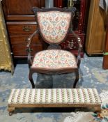 Early 20th century open framed mahogany armchair, the shaped back and seat upholstered in  colourful