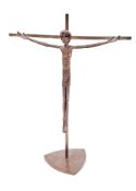 --Lot Withdrawn-- Modernist bronze sculpture depicting the crucifixion, on a curved triangular base,