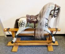 Collinson dapple grey rocking horse on platform base 96cm high, 110cm long Condition Report Good