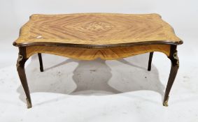 Italian style mahogany coffee table, the shaped quarter veneered top with floral marquetry inlay, on