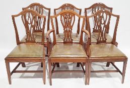 Set of twelve mahogany Hepplewhite-style dining chairs, each with camel back top rail, pierced