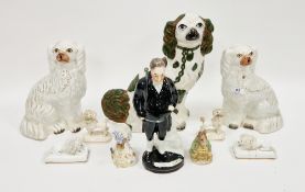 Collection of Staffordshire pottery and porcelain models of poodles, early 19th century,