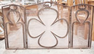 Hand-forged wrought iron three-fold firescreen by local blacksmith Richard Overs of Painswick, circa