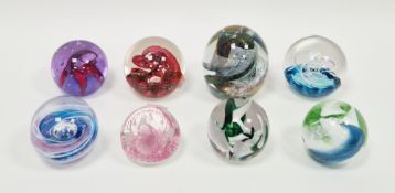Eight assorted glass paperweights to include four examples by Selkirk, one by Ada Loumani, two by