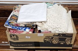 Collection of linen and lace, including tablecloths, an Indian panel embroidered with animals and