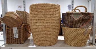 Collection of wicker and woven grass items, including baskets and table mats together with a