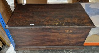 19th century stained pine blanket box with candle tray to interior, carrying handles on a plinth