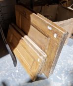 Two pairs of pine panelled cupboard doors, largest 66cm x 55cm