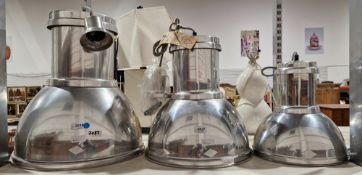 Three industrial style polished metal lamp shades, made by Original BTC of graduating sides, the