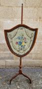 Floral needlework pole screen and victorian mahogany three fold dressing table mirror.