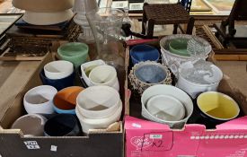 Collection of mainly ceramic flower pots, together with a pair of green swirl glass vases and a