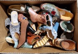 Collection of mainly resin decorative display shoe