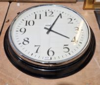 Ikea Bravur large wall clock in a black frame, 58cm dia