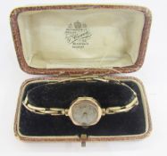 9ct rosegold cased wristwatch, mid-20th century, on gilt expanding strap