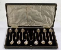 Cased set of twelve Edward VII silver apostle teaspoons and sugar tongs, Chester 1906, Walker &