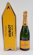 Veuve Clicquot Brut champagne, yellow label, 750ml 12% vol., housed in a yellow arrow tin,