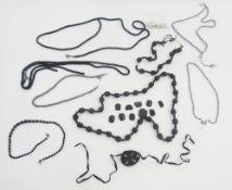 Three strings of purple cultured pearls, jet and other necklaces