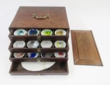 Rosewood artist's paint box, late 19th/early 20th century, with sliding front panel enclosing four