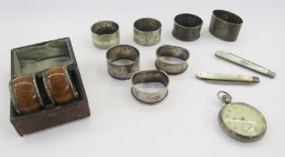 Five silver napkin rings, two Victorian mother-of-pearl silver-mounted pocket knives and a silver