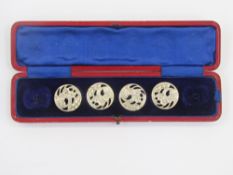 Set of four out of six silver Art Nouveau buttons, marked Birmingham 1903, in original case but as s