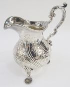 William IV silver cream jug, London 1834 by Paul Storr, of baluster form raised on three cast floral