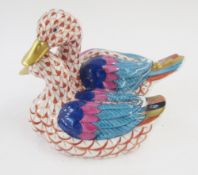 Herend porcelain group of two ducks in red fishnet design with gilt highlights, 11cm long x 7cm high