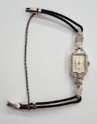 Art Deco lady's platinum and diamond cocktail watch, the dial with Arabic and baton hour markers,