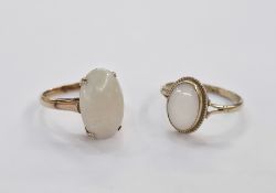 14K and opal ring the oval stone claw set, size M, a 9ct gold and opal ring the oval stone with