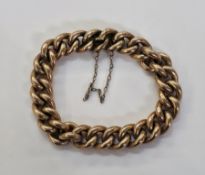 9ct yellow gold curb link bracelet with safety chain, approx 20cm long, approx total weight 27g