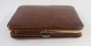 Leather skin wallet/cigar case, with expanding sides, 14.5cm x 10cm, boxed.