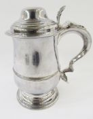 George III silver lidded tankard probably by James Stamp, London 1790, of baluster form with moulded