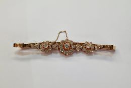 18ct yellow gold and diamond set bracelet, consisting of three clusters claw set with round