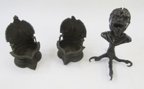 19th century bronze table lighter cast as the bust of a man on a bird's claw foot, the man with open