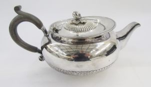 Victorian silver teapot, London 1883, Charles Frederick Hancock of squat baluster form, the fluted