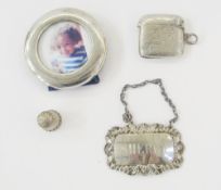 Edwardian silver vesta case, scroll engraved, Birmingham 1903, a small silver circular photograph