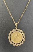 1912 half sovereign in 9ct gold scallop pendant mount, on 9ct gold fancy fine curb link chain, total