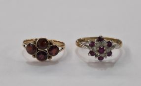 Two 9ct yellow gold rings, the first with four collet set round mixed cut garnets, ring size M,